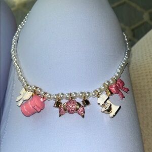 Betsey Johnson Pink and Gold Charm Necklace